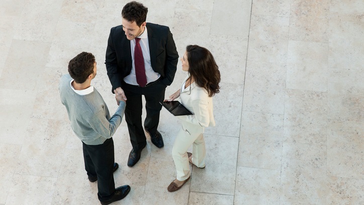 Colleagues shaking hands